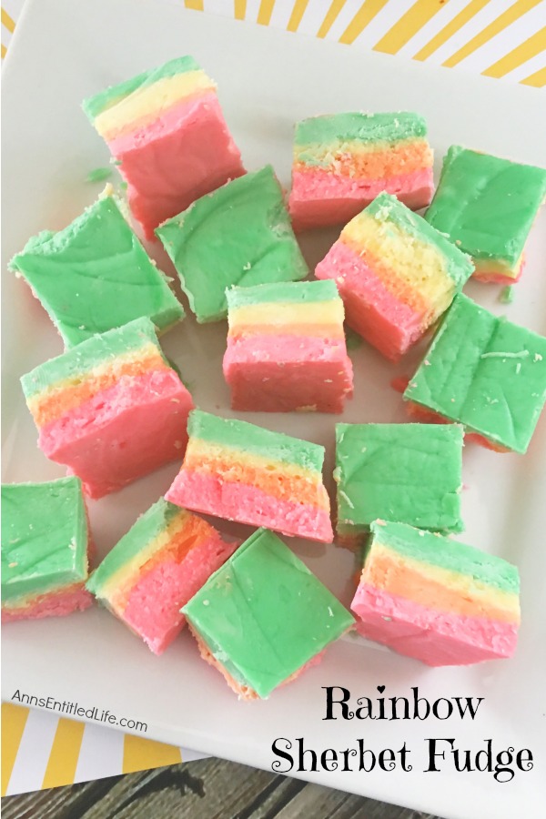 pink, orange, yellow, green rainbow fudge on a white plate