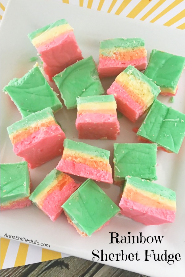 pink, orange, yellow, green rainbow fudge on a white plate