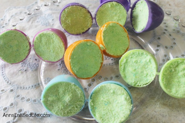 DIY Easter Egg Bath Bombs. Make your children something different for their Easter baskets this year with this fun DIY Easter Egg Bath Bombs recipe. Simple to make, these DIY Easter Egg Bath Bombs don't require many ingredients.