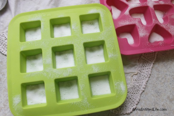 Invigorating Sugar Scrub Cubes made with pure Spearmint Essential Oil. If you are a fan of making your own body products and you love using a good scrub at bath time then you will really like this Spearmint Sugar Scrub Cubes recipe. They are super easy to make; about 10 minutes to prepare, plus cool time.  These Spearmint Sugar Scrub Cubes smell so good and make your skin feel wonderful too.