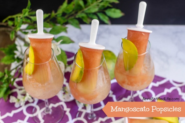 Mangoscato Popsicles Recipe. A delicious, cool and fun ice pop dessert and libation in one. These Mangoscato Popsicles are a special sweet and tasty treat for adults on a hot summer day!