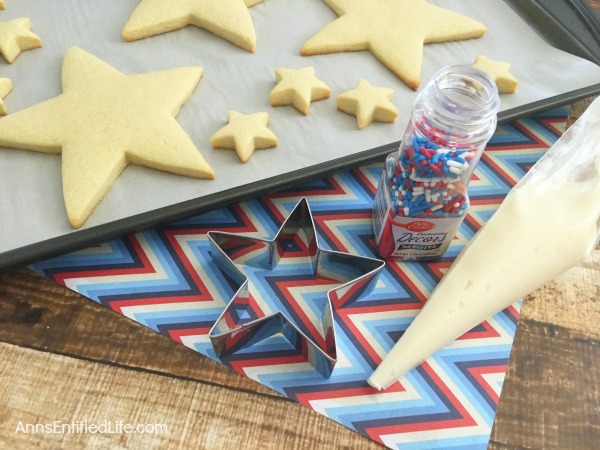 Homemade Star Cookies Recipe. A fun and festive star cookie treat, perfect for summer picnics, Independence Day celebrations and more! This delicious vanilla dough and accompanying vanilla frosting recipe will have your friends and family gobbling up these tasty Homemade Star Cookies!