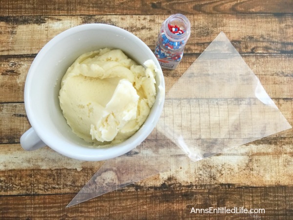 Homemade Star Cookies Recipe. A fun and festive star cookie treat, perfect for summer picnics, Independence Day celebrations and more! This delicious vanilla dough and accompanying vanilla frosting recipe will have your friends and family gobbling up these tasty Homemade Star Cookies!