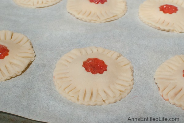 Strawberry Rhubarb Hand Pies Recipe. Homemade pie, but no utensils required to eat. These delicious, sweet and tart, easy to make Strawberry Rhubarb Hand Pies are great for dessert, lunch boxes, snacks and portion control.