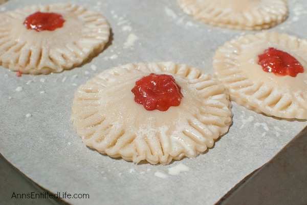 Strawberry Rhubarb Hand Pies Recipe. Homemade pie, but no utensils required to eat. These delicious, sweet and tart, easy to make Strawberry Rhubarb Hand Pies are great for dessert, lunch boxes, snacks and portion control.