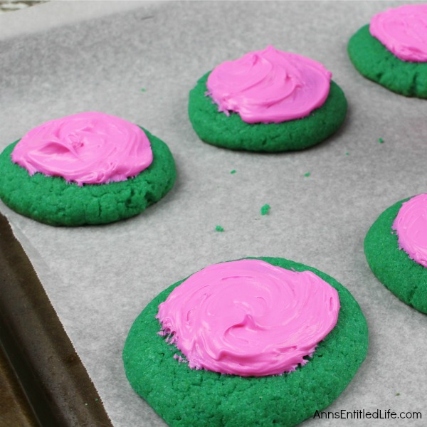 Watermelon Cookies Recipe. These adorable Watermelon cookies are so simple to make! Use a cake mix to make these delicious cookies that taste look and taste like a watermelon. These are a fun time summer cookie that your children, family and friends will love.