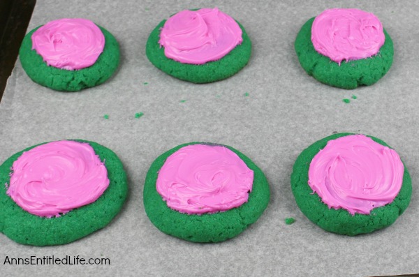 Watermelon Cookies Recipe. These adorable Watermelon cookies are so simple to make! Use a cake mix to make these delicious cookies that taste look and taste like a watermelon. These are a fun time summer cookie that your children, family and friends will love.