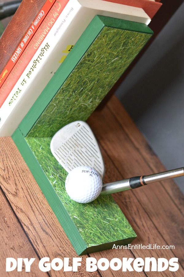 Right side of handmade bookends with golf club decor. There are several books in between the book ends. This is set upon a mantel, against a grey wall background.