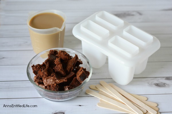 Brownie Mocha Popsicles Recipe. The delicious taste of coffee combined with fantastic, chewy and decadent brownies make for a heavenly frozen confection. Make your own popsicles with this easy Brownie Mocha popsicles Recipe for a delicious frozen treat.