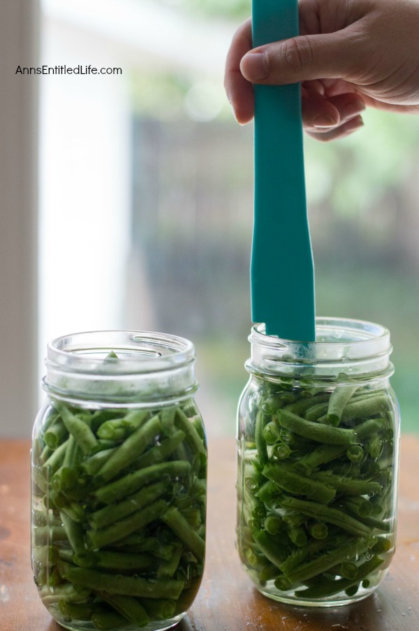 Canned Green Beans Recipe. A super easy home canning recipe with step by step tutorial photographs on how to can green beans. In under an hour you can preserve your harvest of green beans to enjoy year-round.