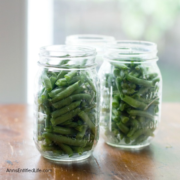 Canned Green Beans Recipe. A super easy home canning recipe with step by step tutorial photographs on how to can green beans. In under an hour you can preserve your harvest of green beans to enjoy year-round.