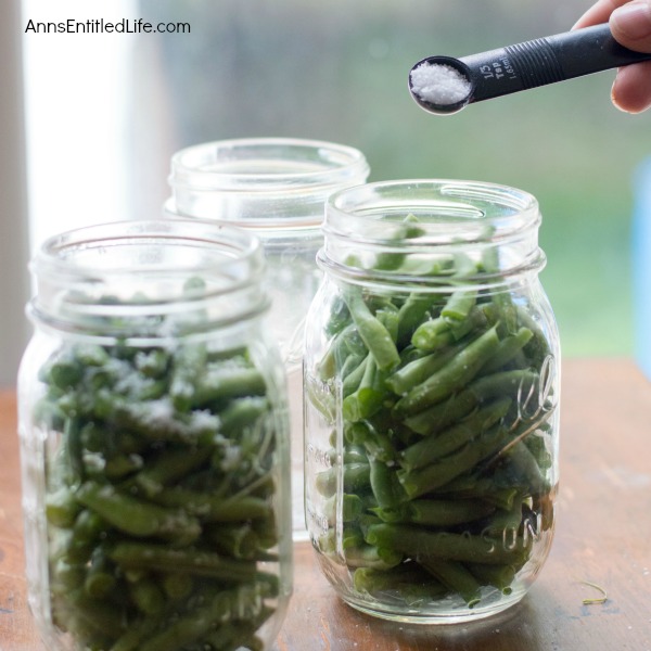 Canned Green Beans Recipe. A super easy home canning recipe with step by step tutorial photographs on how to can green beans. In under an hour you can preserve your harvest of green beans to enjoy year-round.