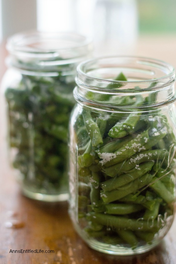 Canned Green Beans Recipe. A super easy home canning recipe with step by step tutorial photographs on how to can green beans. In under an hour you can preserve your harvest of green beans to enjoy year-round.