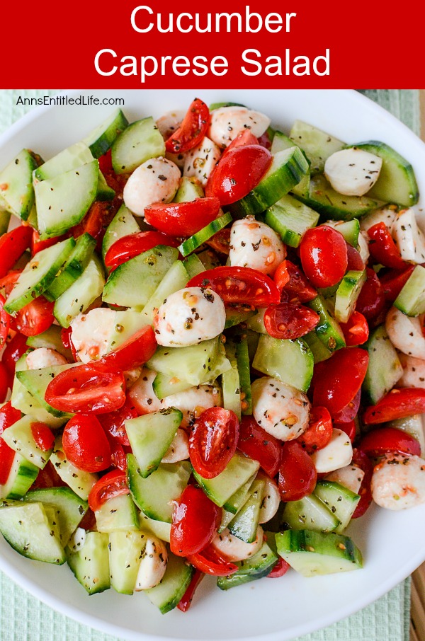 A closeup of the mozzerella, cucumbers, basil, onion, tomatoes in a cucumber Caprese salad