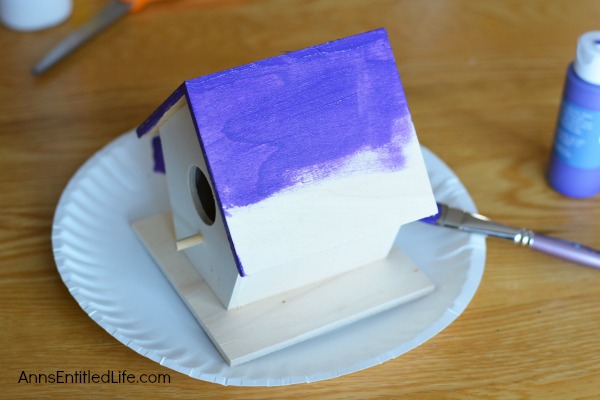 Decoupage Birdhouse. Take a plain box birdhouse and make it a real showpiece with this easy decoupage birdhouse craft!