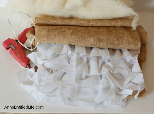 DIY Easy No Sew Throw Pillow. Make this easy, no sew throw pillow for a quick decor update. This step by step tutorial will teach you how to make this no sew ruffle burlap pillow in a short time. Simple to make, this ruffled burlap pillow is adorable for bed decor, family room decor or even casual living room decor!