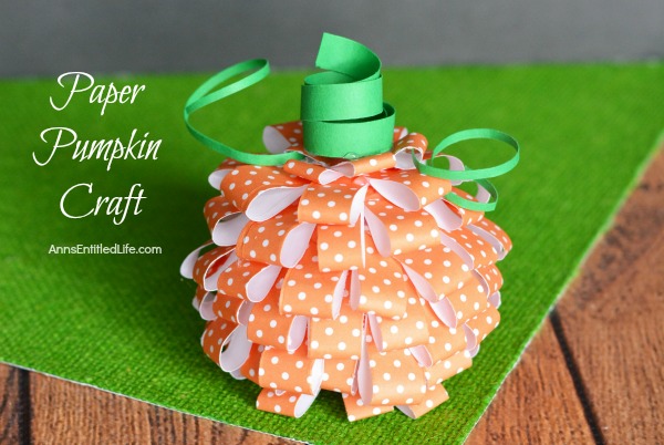 Paper Pumpkin Craft. This sweet little Paper Pumpkin Craft is perfect for autumn decor! Make one, make three, make a dozen; the more the merrier and they are easy to fabricate. Whether looking for mantel or tablescape decorations or just a whimsical adornment for a side table or windowsill, this simple to make Paper Pumpkin Craft is a great addition to your fall decorating scheme.