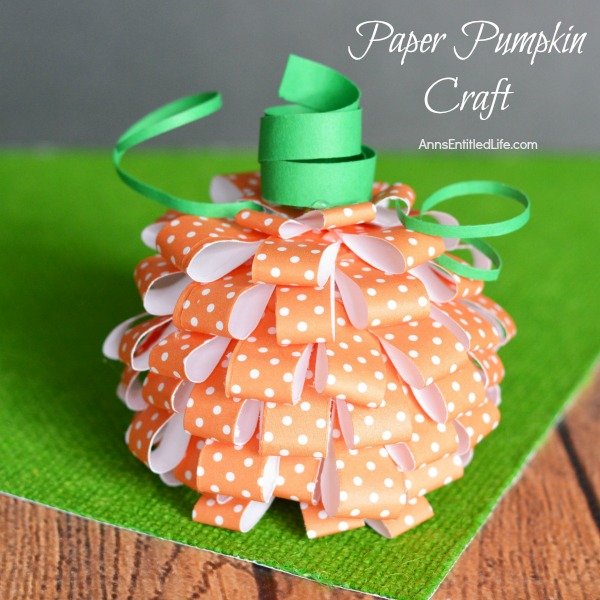 Paper Pumpkin Craft. This sweet little Paper Pumpkin Craft is perfect for autumn decor! Make one, make three, make a dozen; the more the merrier and they are easy to fabricate. Whether looking for mantel or tablescape decorations or just a whimsical adornment for a side table or windowsill, this simple to make Paper Pumpkin Craft is a great addition to your fall decorating scheme.