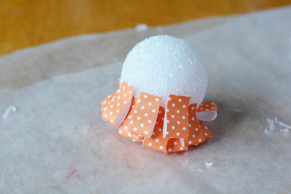 Paper Pumpkin Craft. This sweet little Paper Pumpkin Craft is perfect for autumn decor! Make one, make three, make a dozen; the more the merrier and they are easy to fabricate. Whether looking for mantel or tablescape decorations or just a whimsical adornment for a side table or windowsill, this simple to make Paper Pumpkin Craft is a great addition to your fall decorating scheme.