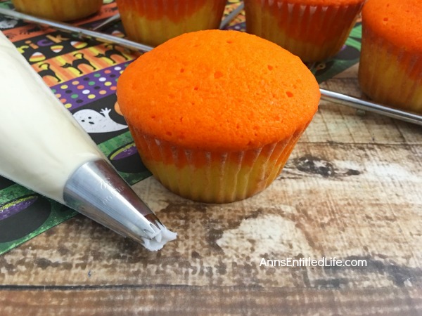 Candy Corn Cupcakes Recipe. A fall favorite, these delicious, easy to make sweet cupcake treats are perfect for snack-time, lunch-time, anytime! Get into the spirit of Autumn with these adorable Candy Corn Cupcakes.