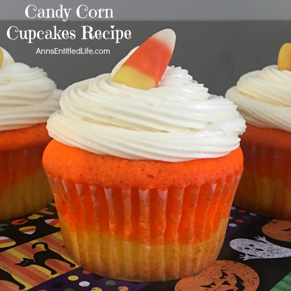 Candy Corn Cupcakes Recipe. A fall favorite, these delicious, easy to make sweet cupcake treats are perfect for snack-time, lunch-time, anytime! Get into the spirit of Autumn with these adorable Candy Corn Cupcakes.