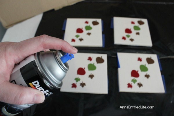 Easy DIY Autumn Coasters. These DIY Autumn coasters are simple to make. Instead of resin, they use a spray to form a heat resistant coating (to 500 degrees!) which seals and protects. Add a touch of fall decor to your living area with these easy to make autumn coasters.