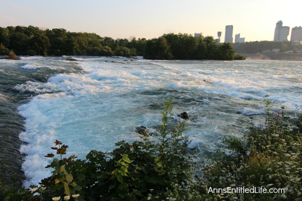 Niagara Falls at Night! Every evening the Falls are lit with color. It is truly a beautiful sight. This post has many photographs of Niagara Falls, NY in the evening. These are summer night photos.