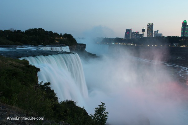 Niagara Falls at Night! Every evening the Falls are lit with color. It is truly a beautiful sight. This post has many photographs of Niagara Falls, NY in the evening. These are summer night photos.