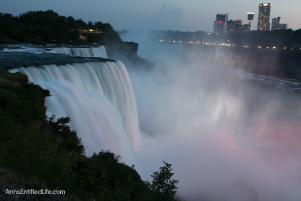 Niagara Falls at Night! Every evening the Falls are lit with color. It is truly a beautiful sight. This post has many photographs of Niagara Falls, NY in the evening. These are summer night photos.