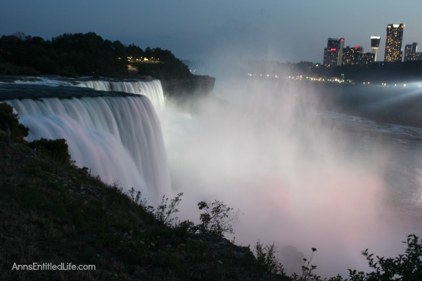 Niagara Falls at Night! Every evening the Falls are lit with color. It is truly a beautiful sight. This post has many photographs of Niagara Falls, NY in the evening. These are summer night photos.