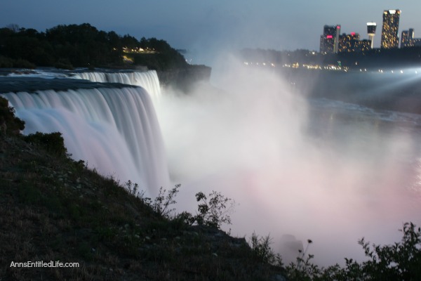 Niagara Falls at Night! Every evening the Falls are lit with color. It is truly a beautiful sight. This post has many photographs of Niagara Falls, NY in the evening. These are summer night photos.