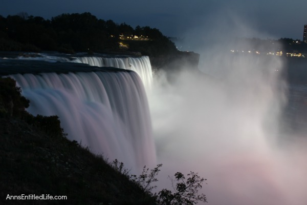Niagara Falls at Night! Every evening the Falls are lit with color. It is truly a beautiful sight. This post has many photographs of Niagara Falls, NY in the evening. These are summer night photos.