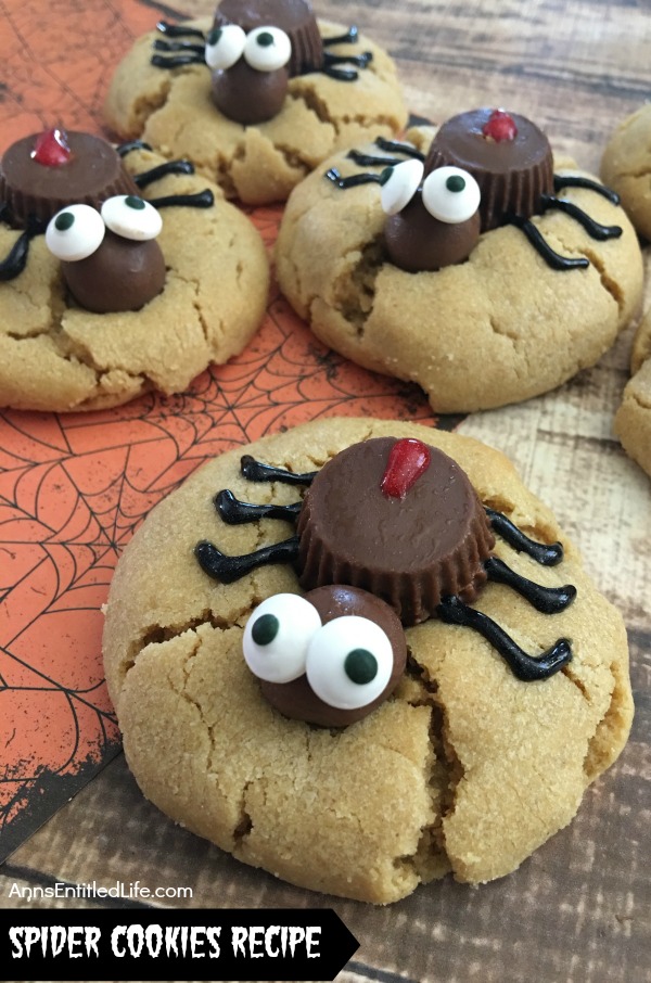 candy spider on top of a peanut butter cookie, 4 cookies total