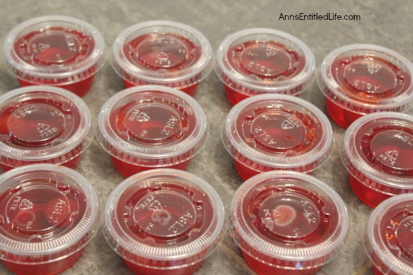 Cherry Surprise Jello Shots Recipe. This delightful cherry almond jello shot offers a nice little surprise in the middle. Simple to make, these Cherry Surprise Jello Shots are great for parties, tailgating, and more!