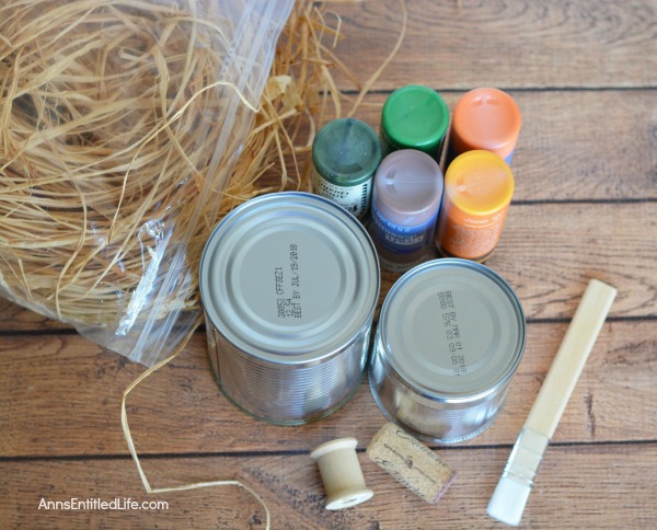 Tin Can Pumpkins Craft. A cute way to upcycle your soup, vegetable and fruit cans into a darling autumn craft. This Tin Can Pumpkins Craft is a variation of the tin can painting that we all learned in grade school. This is a simple craft that is easy enough for a child to make with some adult supervision.