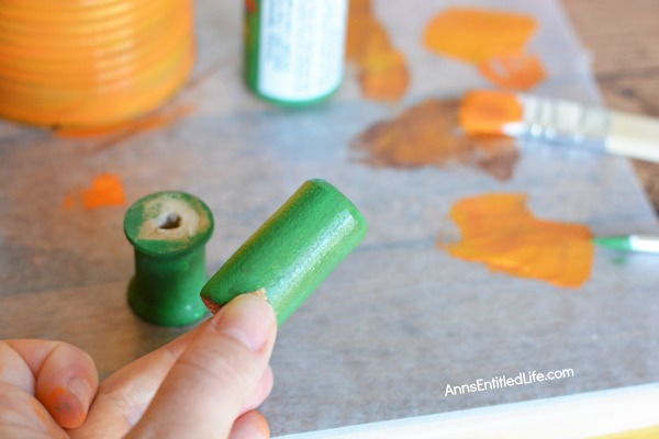 Tin Can Pumpkins Craft. A cute way to upcycle your soup, vegetable and fruit cans into a darling autumn craft. This Tin Can Pumpkins Craft is a variation of the tin can painting that we all learned in grade school. This is a simple craft that is easy enough for a child to make with some adult supervision.