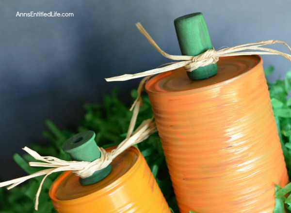 Tin Can Pumpkins Craft. A cute way to upcycle your soup, vegetable and fruit cans into a darling autumn craft. This Tin Can Pumpkins Craft is a variation of the tin can painting that we all learned in grade school. This is a simple craft that is easy enough for a child to make with some adult supervision.