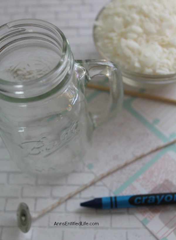 Homemade Mason Jar Soy Candle. Easily and inexpensively make your own Homemade Mason Jar Soy Candle! This is great for gifts or to scent your own home anytime of the year. Easily customize these candles to any color you like. This Homemade Mason Jar Soy Candle is a fun DIY project that yields great results!