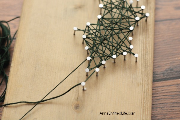 Holly Berry String Art. Make your own beautiful Holly Berry String Art with this step by step tutorial. Included are the printable patterns, easy to follow directions and tutorial photographs so you can make this lovely Christmas craft yourself. Keep for yourself, or give as a gift!