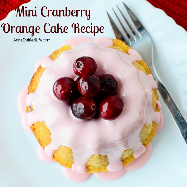 Mini Cranberry Orange Cake Recipe. This festive holiday dessert recipe is so easy to make! Only you will know the base is a boxed cake mix; your friends and family will marvel at your creativity while devouring these delicious Mini Cranberry Orange Cakes.