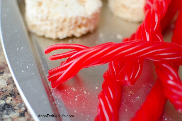 Edible Cereal Ornaments Recipe. Fun rice crispy cereal treats shaped like Christmas ornaments! These kid friendly, festive Edible Cereal Ornaments are easy to make and so delicious!