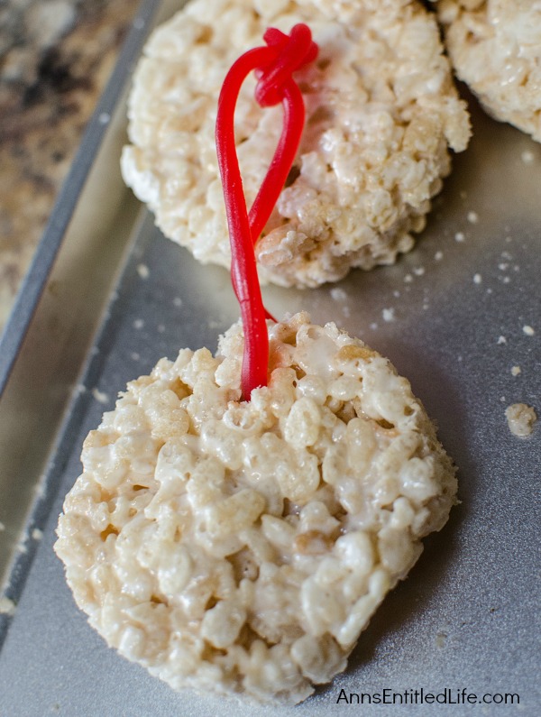 Edible Cereal Ornaments Recipe. Fun rice crispy cereal treats shaped like Christmas ornaments! These kid friendly, festive Edible Cereal Ornaments are easy to make and so delicious!