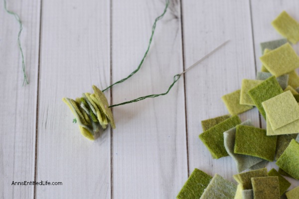 Felt Wreath Ornament Craft. Homemade Christmas ornaments are special crafts to keep, and to give. These easy Felt Wreath Ornaments are simply adorable! Older children, under adult supervision, can also make these felt wreaths using the step by step tutorial photographs and instructions as guidance.