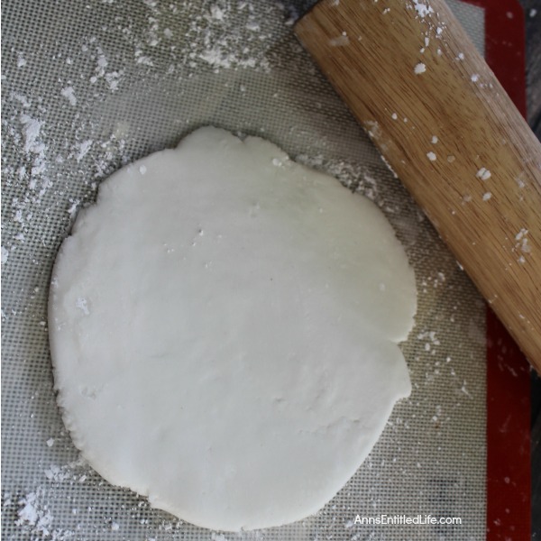 Homemade Peppermint Patties Recipe. A light coating of decadent dark chocolate, and the smooth white center with a kiss of peppermint. If you love the cool and refreshing taste of peppermint, you will love these Homemade Peppermint Patties candy.