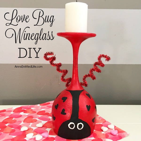 Love Bug Wineglass DIY. Make your own adorable Love Bug Wineglass. This easy step by step tutorial will show you how to easily make a wine glass love bug which is perfect for a centerpiece, mantel decor or table decorations this Valentine's Day, or for a wonderful spring or summer craft! If you are looking for an adorable craft project, this is it!