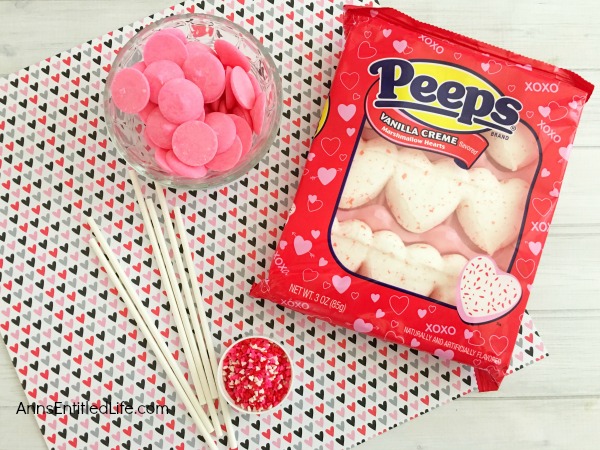 Easy Heart Peeps Pops Recipe. Dress up marshmallow Peeps hearts with holiday sprinkles and chocolate! These simple to make Peeps pops will be a big hit with friends and family this Valentine's Day. If you are looking for a simple to make Valentine Day candy treat, this is it.