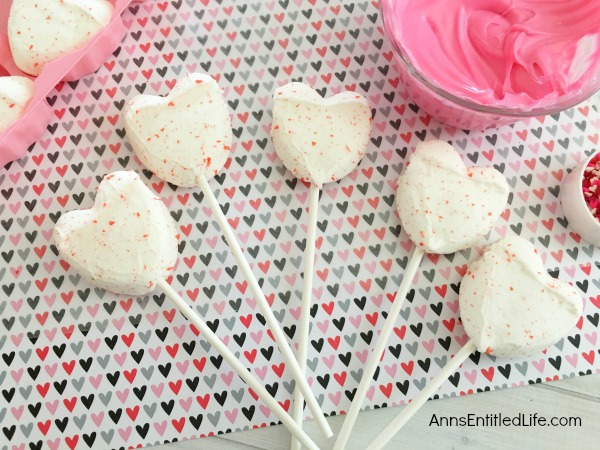 Easy Heart Peeps Pops Recipe. Dress up marshmallow Peeps hearts with holiday sprinkles and chocolate! These simple to make Peeps pops will be a big hit with friends and family this Valentine's Day. If you are looking for a simple to make Valentine Day candy treat, this is it.