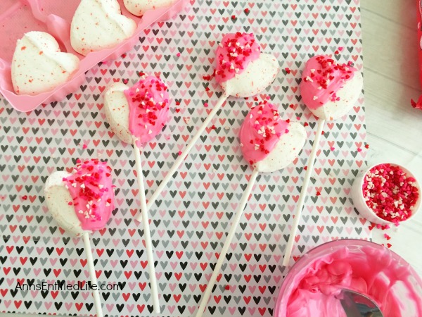 Easy Heart Peeps Pops Recipe. Dress up marshmallow Peeps hearts with holiday sprinkles and chocolate! These simple to make Peeps pops will be a big hit with friends and family this Valentine's Day. If you are looking for a simple to make Valentine Day candy treat, this is it.