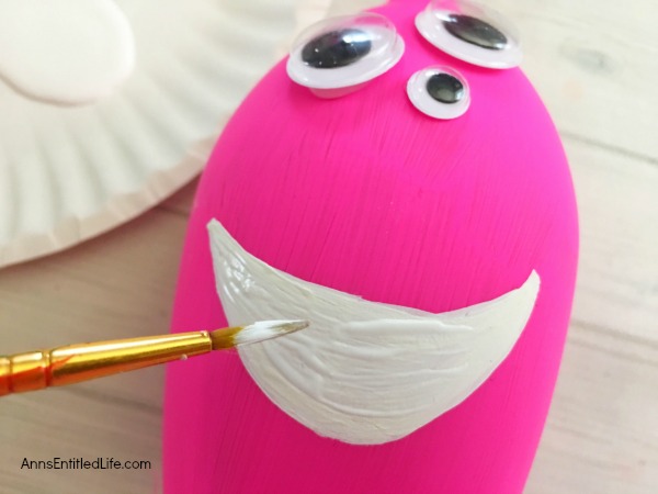Love Monster Wineglass DIY. Make your own adorable Love Monster Wineglass. This easy step by step tutorial will show you how to easily make a cute and charming wineglass monster which is perfect for a centerpiece, mantel decor or table decorations on Valentine's Day or Halloween! If you are looking for an adorable craft project, this is it!
