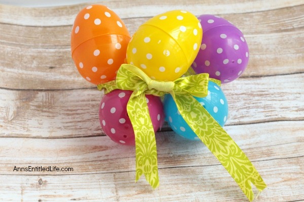 DIY Easter Egg Wreath. This Easter egg grapevine wreath is a wonderful spring door craft. This cute, simple to make, Easter egg wreath is an inexpensive Easter decoration, perfect decor for your door, over your fireplace or on a wall.